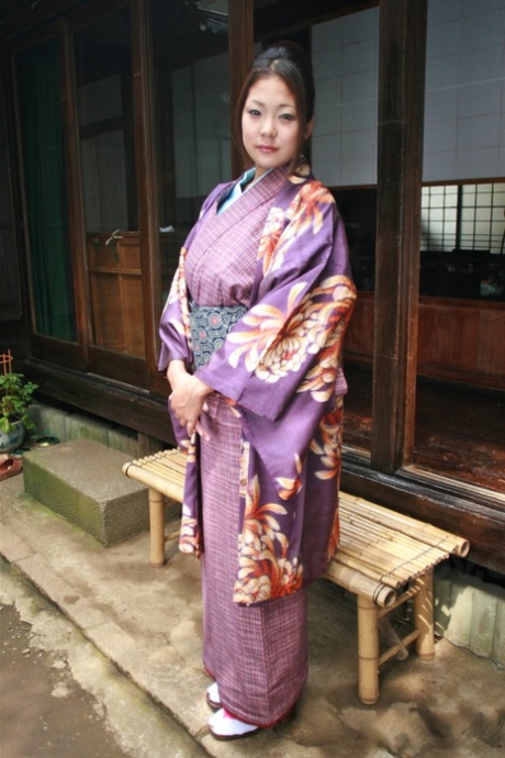 A Japanese female wears a no panty upskire and pulls it off on the patio.