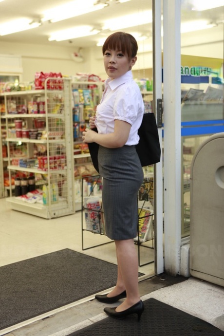 Japanese model Ai Yoneyama looks stunning in public with her tight pencil skirt.