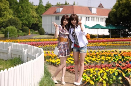 When taking a walk, Japanese lesbians Rimu Endo and Ueno Misaki reveal their naked legs.