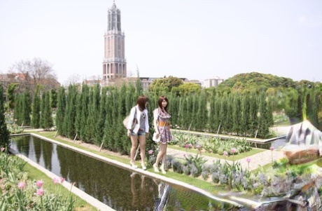 While walking, Rimu Endo and Ueno Misaki, both Japanese lesbians, display their bare legs.