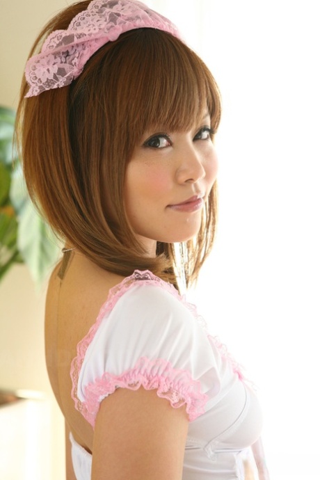 Adorable Japanese Redhead Hitomi Yoshino Poses Non Nude In A Maid's Uniform