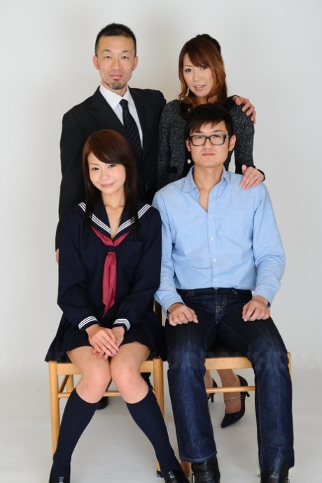 MiLF Jun Kusanagi, along with her stepdaughter Yuri Aine, is seen in a nude photo with two charming gentlemen.