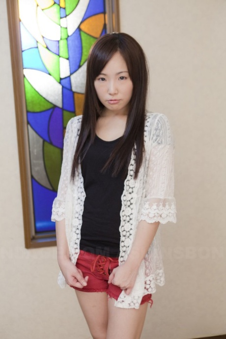 At the casting, an innocent Japanese babe was seen donning a charming red shorts outfit.