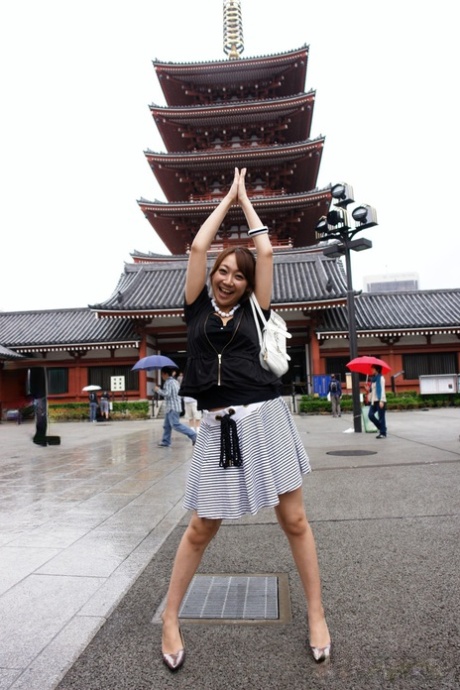 Ryo Akanishi, a beautiful Japanese beauty, displays some leg and bust features while out in public.