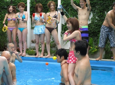 Japanese beauty contestants lose their bikinis while participating in a swimming pool wrestling match.