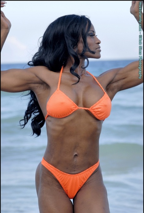 Ebony Bodybuilder Debra Dunn Poses At The Ocean In A String Bikini