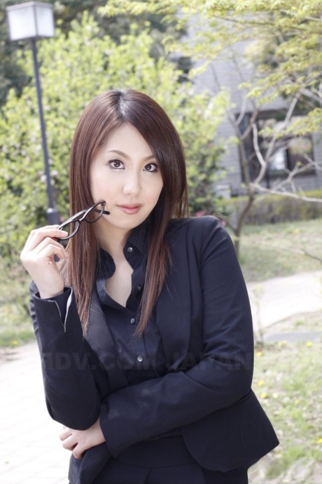 As she dresses for business occasions, Japanese model Hikaru Matsu switches between her glasses on and off.