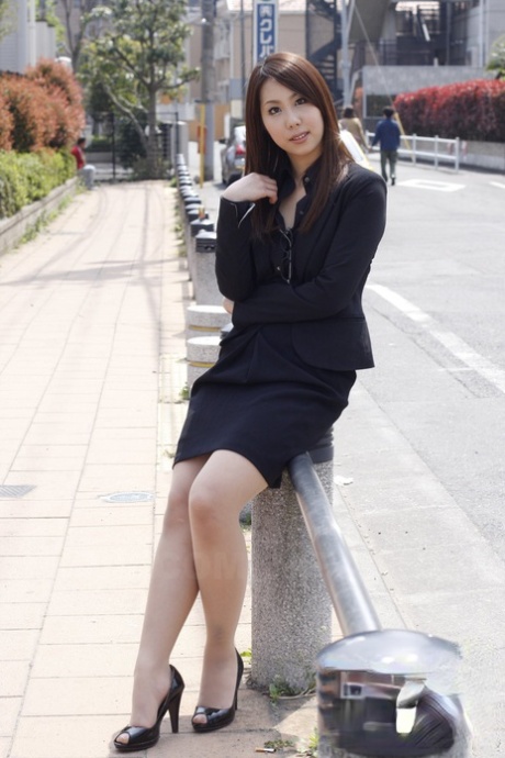 Japanese model Hikaru Matsu wears business attire, changing her glasses frequently.