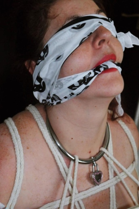 Women with red lisp are left gagged and tied up by ropes.