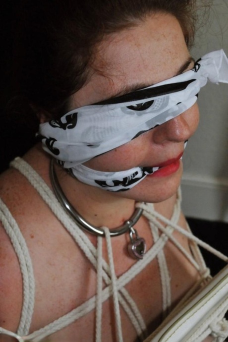 Roles are used to fasten a fat female with red lisp, leaving her gagged and tied up.