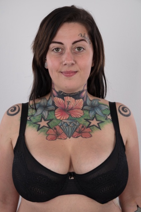 Body fat: The tattooed amateur, known as Nikola lets go of her clothes.