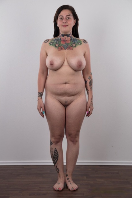 A tattooed non-professional named Nikola lets her excess body out of clothing.