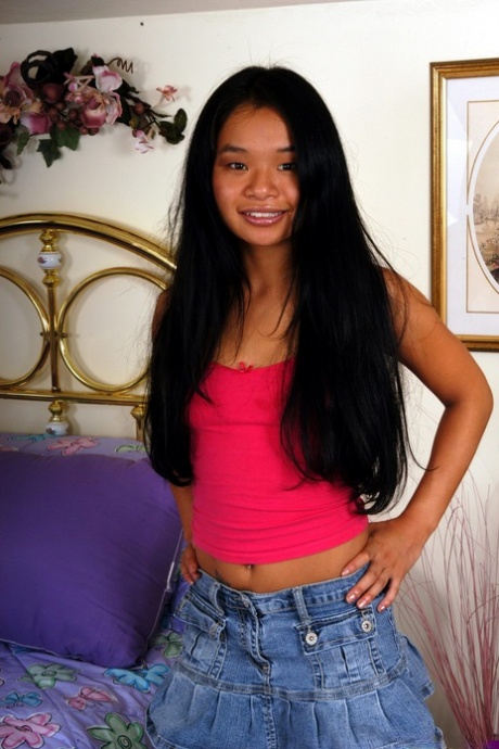 Asian Teen With Long Hair Flashes Cotton Panties Before Masturbating On A Bed