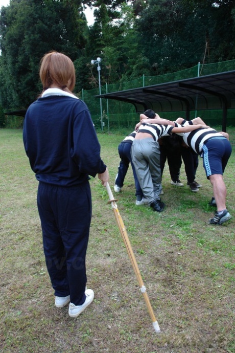 An Umemiya, a Japanese female, blows a small penis while dressed up.