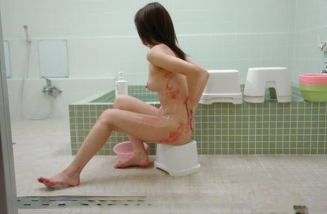 Petite Japanese Teen Remi Kawamura Takes Piss With Her Legs Spread Wide Open