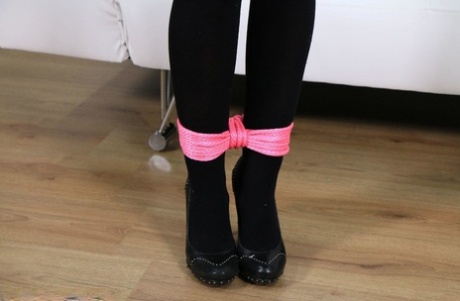 Blonde, fully clothed, pooped through his trousers and tied up in pink rope with black stockings.