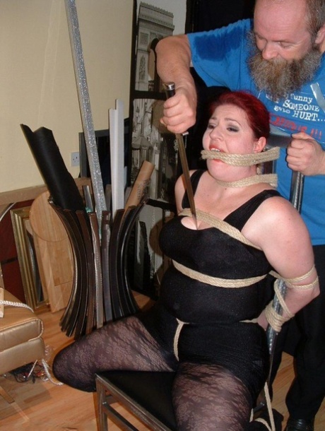 Overweight Redhead Is Threatened With A Knife While Tied To A Chair