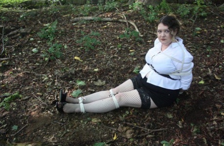 Erect, weighed woman tied up and gagged before being dumped in the woods.