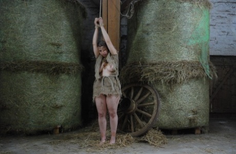 Filthy Fat Woman With Bare Feet Is Kept In A Barn With Chain Shackles