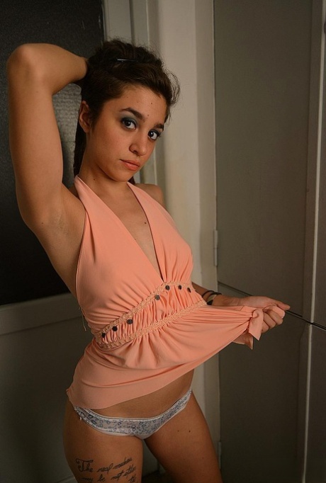 During her college years, Cami is dressed in clothing with long legs and then stripped down completely once more.