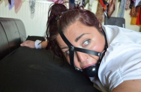 Fat Woman Is Tied To Face Down On A Bed By All Fours While Ball Gagged