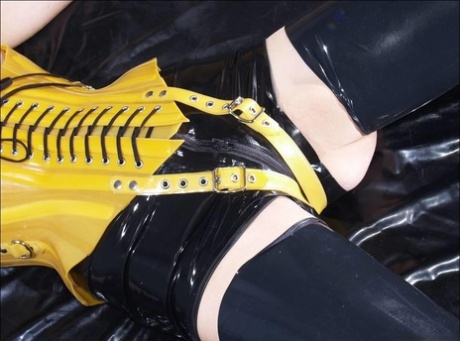 Dark-haired Girl Is Restrained And Masturbated In Latex Before Posing Alone