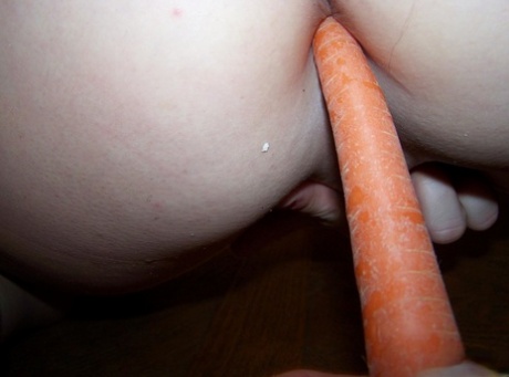 Amateur female, Toni Fay sucking with vegetables on to the table.