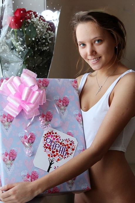 Naked teen with an ass to die for fixes breakfast in the nude on her birthday