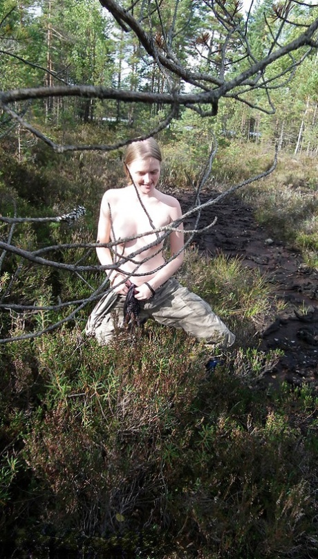 Blonde Amateur Evelina Wanders Thru Clearing In Woods With No Clothes On