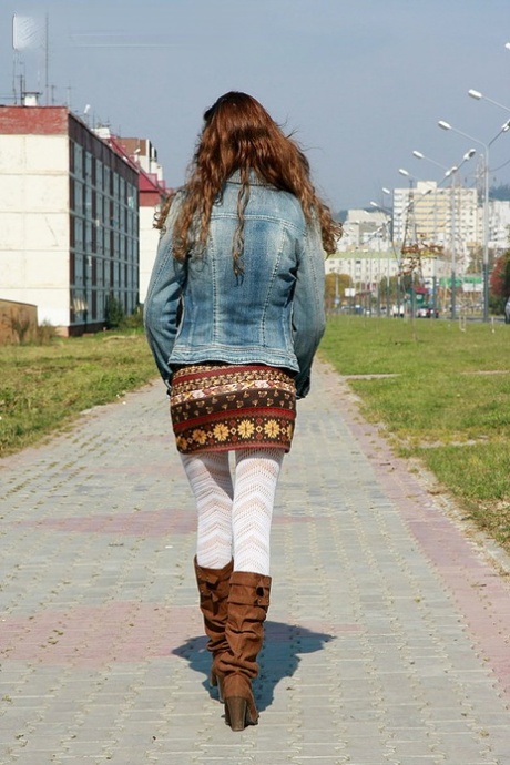 Katya, a beginner model, poses in her own clothes for her photographer friend.