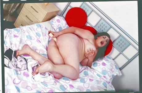 When the brunette dick opens up, her massive breasts are revealed before she plays with pussy.
