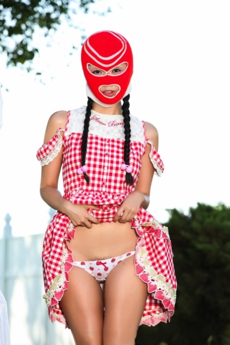 Marica Hase, a delightful girl known for her cuteness, exposes her breast and buttocks while wearing a ski mask.