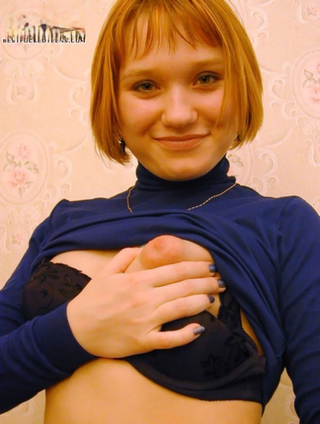 Young Redhead Stretches Out Her Pussy For Closeups With Painted Fingernails