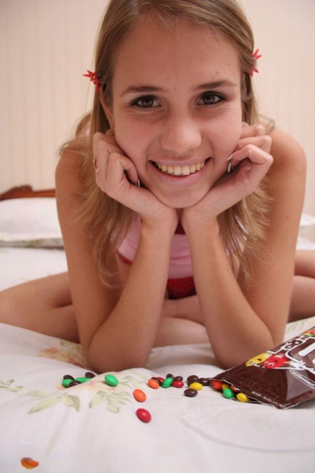 Young Looking First Timer Adorns Her Totally Naked Body In M&M'S
