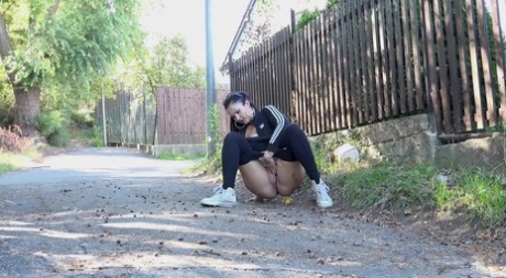 Isabel Dark Pulls Down Her Leggings To Take A Piss On A Road
