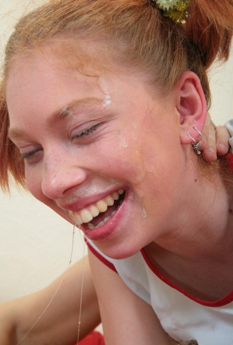 Young redhead wears her hair in pigtails during extreme oral fucking #5