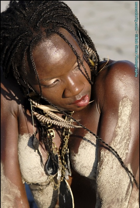 Ebony Bodybuilder Camille Elizabeth Covers Her Toned Body In Beach Sand