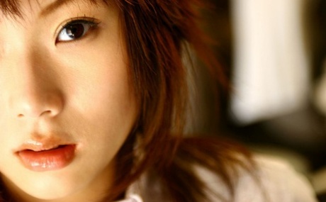 Japanese teen Hina Tachibana sinks her underwear attired body in bathtub