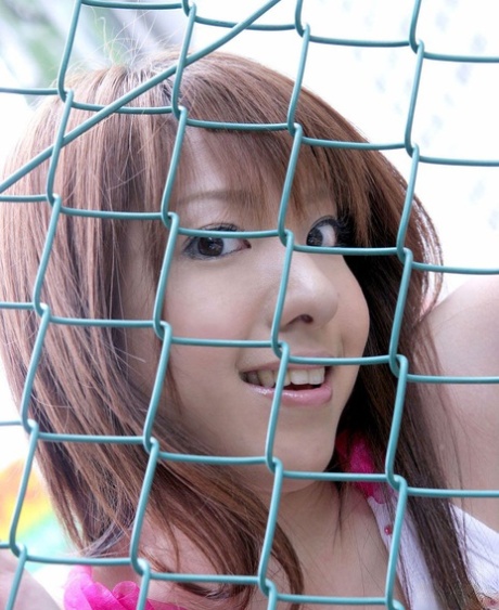 Yuuna, a Japanese girl who looks young and attractive, shows her bra not far behind while she enjoys licking an ice cream.