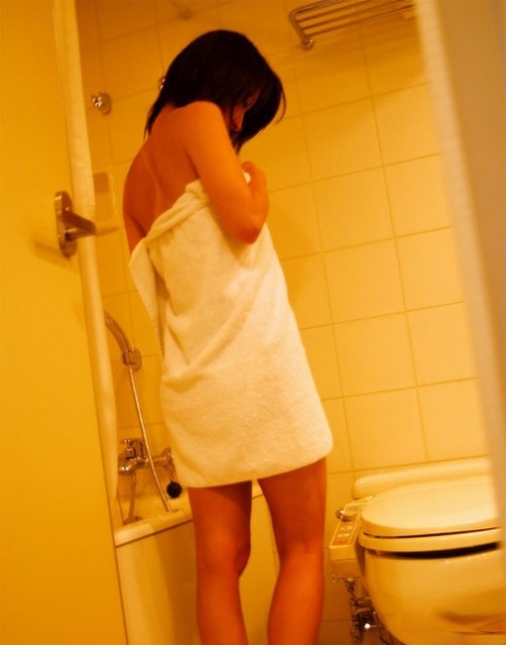 Japanese teen Mai gets completely naked before showering