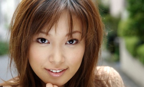 Sexy Japanese girl Yua Aida bares her natural tits and vagina in solo action.