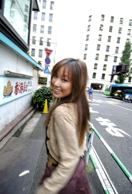 Solo action: Sexy Japanese girl Yua Aida shows off her natural tits and vagina.