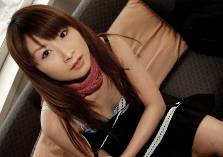 In the restaurant, a charming Japanese girl gets nude after dining.