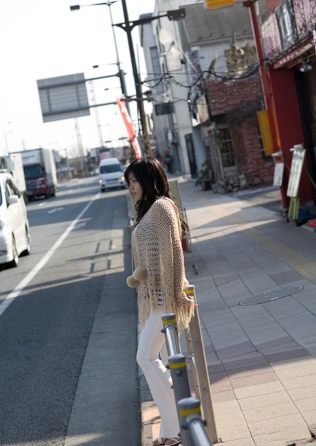 After being naked on her bed, China Yuki, a stunning Japanese girl from Japan, gets dressed in comfortable clothing.