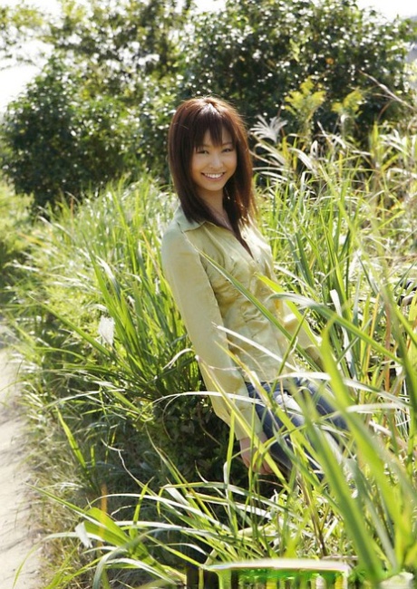 Shocked: Pretty Japanese girl, Hara Sarasa strips to her bikini after taking a cycle ride.