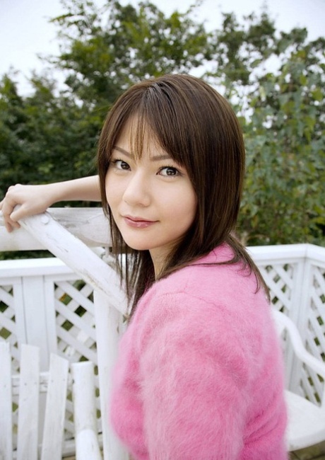 Japanese Model Rira Himesaki Takes Of Her Bra And Panties In The Backyard