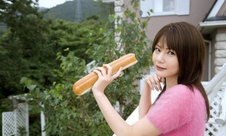 Japanese Model Rira Himesaki Takes Of Her Bra And Panties In The Backyard