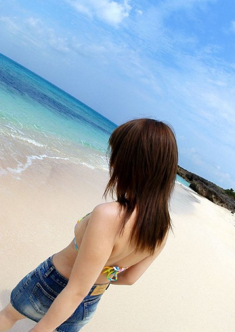 Japanese teen Chikaho Ito models non nude at the beach in a bikini