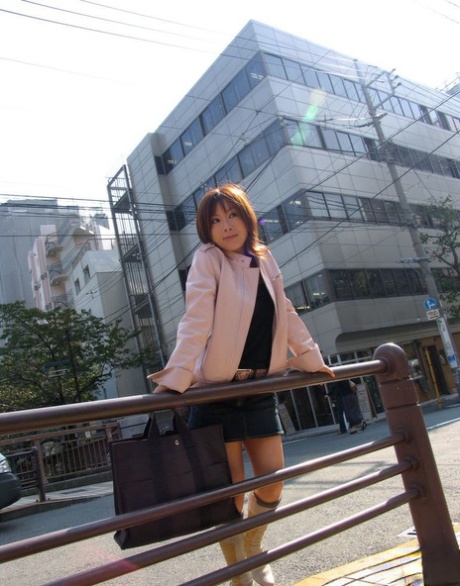 Japanese teen Tomomi gets completely naked after arriving at her residence