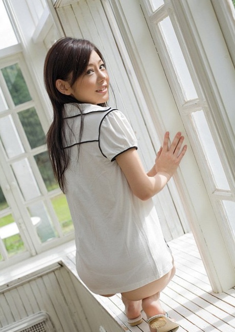 Petite Japanese girl Takami Hou models non nude in see through underwear